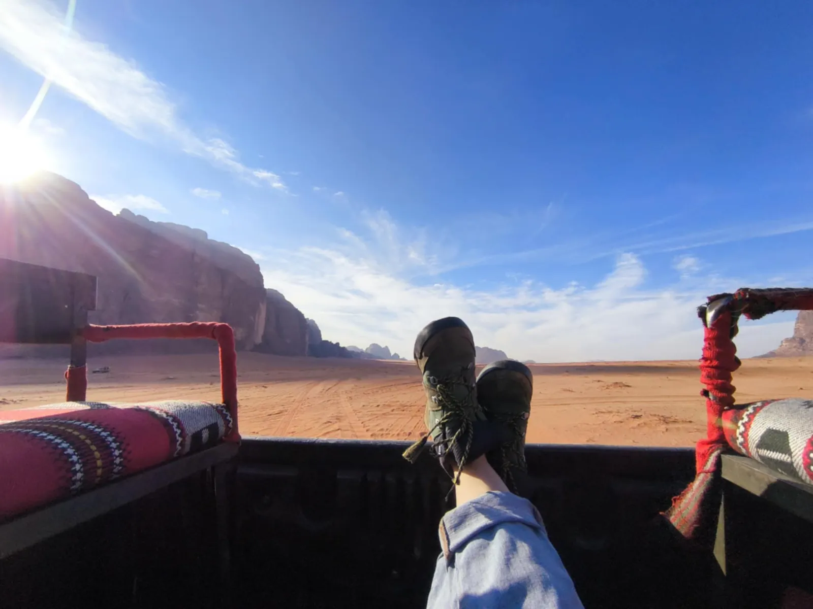 The view forward from the open bed of a 4x4 crossing Wadi Rum