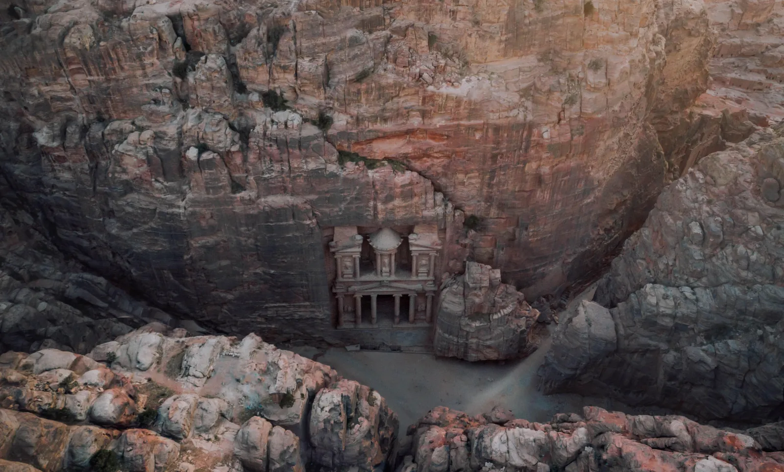 The Treasury seen from the clifftop above, deep in its ravine at Petra